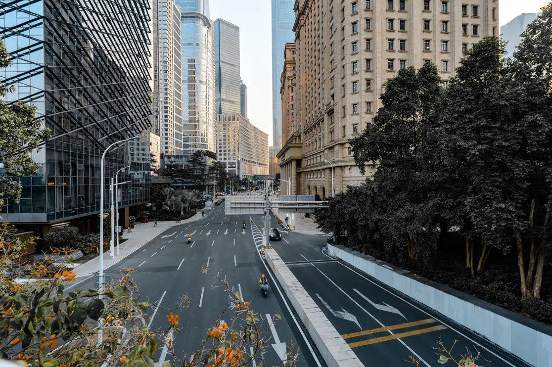 Urban Streetscape Rendering with Vehicles and Green Walkways